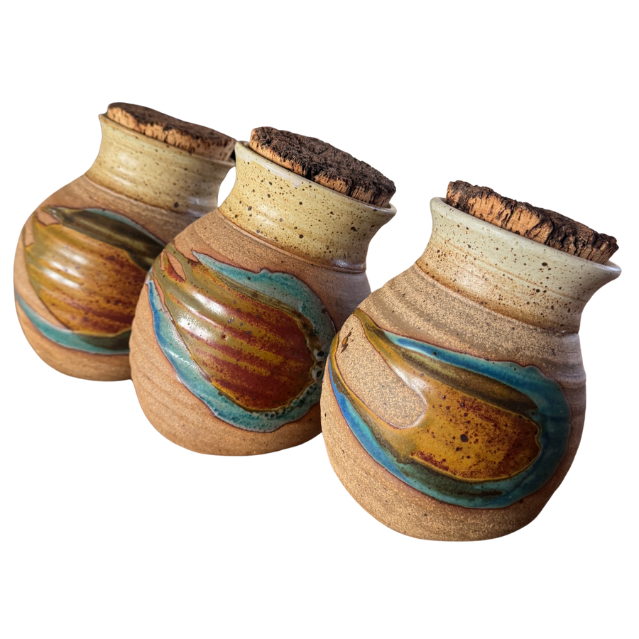 Set of Four Cork Lidded Studio Pottery Canisters