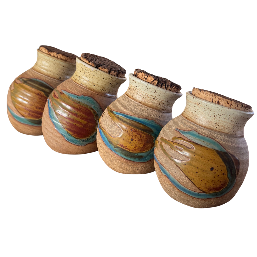 Set of Four Cork Lidded Studio Pottery Canisters