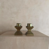 Pair of Structural Brass Candle Holders