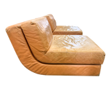 Pair of Curved Armless Leather Lounge Chairs