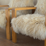 Pair of Vintage Solid Wood and Mongolian Sheepskin Armchairs
