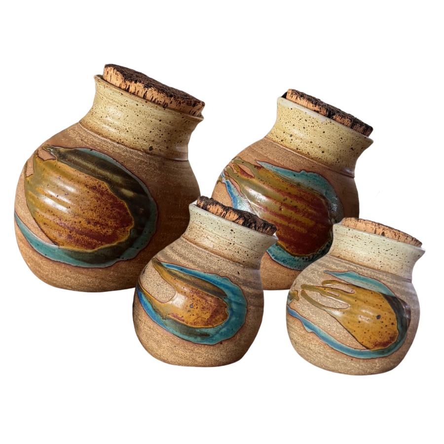 Set of Four Cork Lidded Studio Pottery Canisters