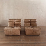 Pair of Cognac Channeled Leather Armless Lounge Chairs