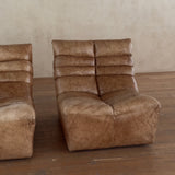 Pair of Cognac Channeled Leather Armless Lounge Chairs