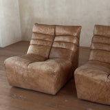 Pair of Cognac Channeled Leather Armless Lounge Chairs