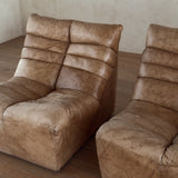 Pair of Cognac Channeled Leather Armless Lounge Chairs