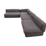 Italian Four Piece Low Modular Sectional in Textured Charcoal Fabric