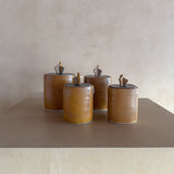 Four Studio Ceramic Lidded Canisters