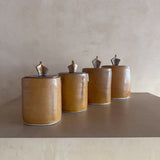 Four Studio Ceramic Lidded Canisters