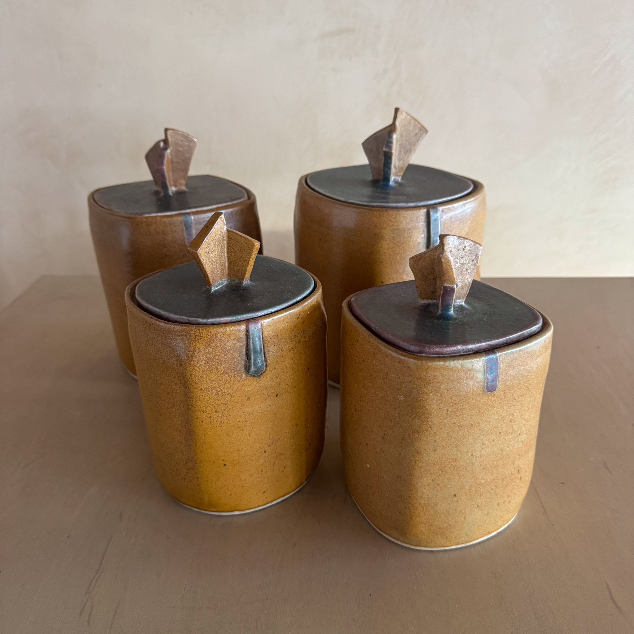Four Studio Ceramic Lidded Canisters