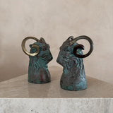 Pair of Brass and Bronze Ram's Heads
