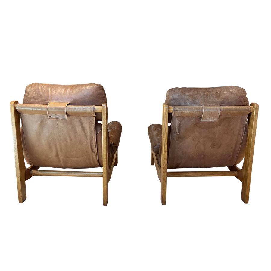 Pair of French MCM Leather Arm Chairs